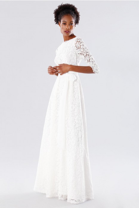 Noleggia online Abito da sposa scampanato in pizzo by Daphne | Drexcode