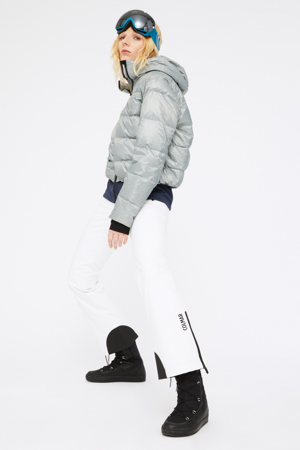 Ski suit with gray puffer jacket