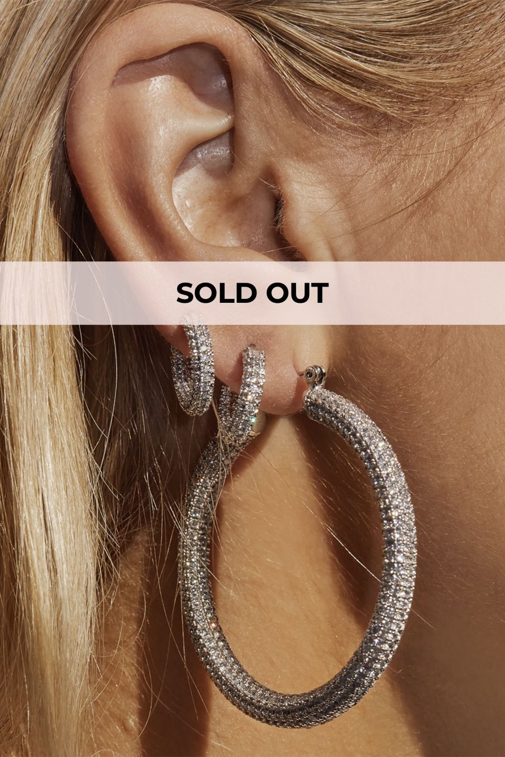 Silver hoop earrings with zircons