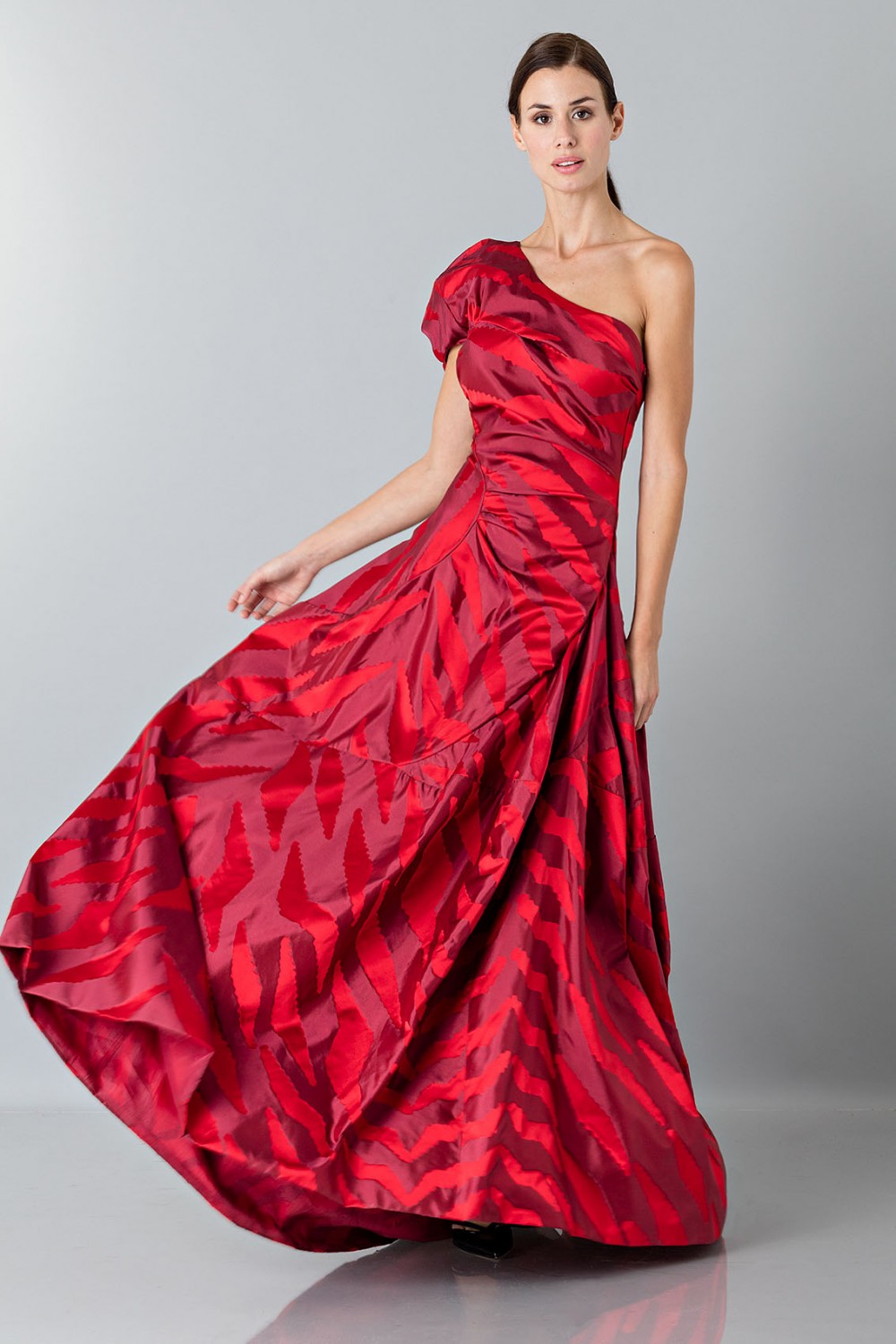 One-shoulder red dress with puff sleeve