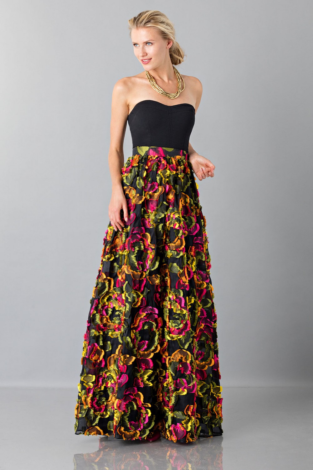 Skirt with floral appliquè