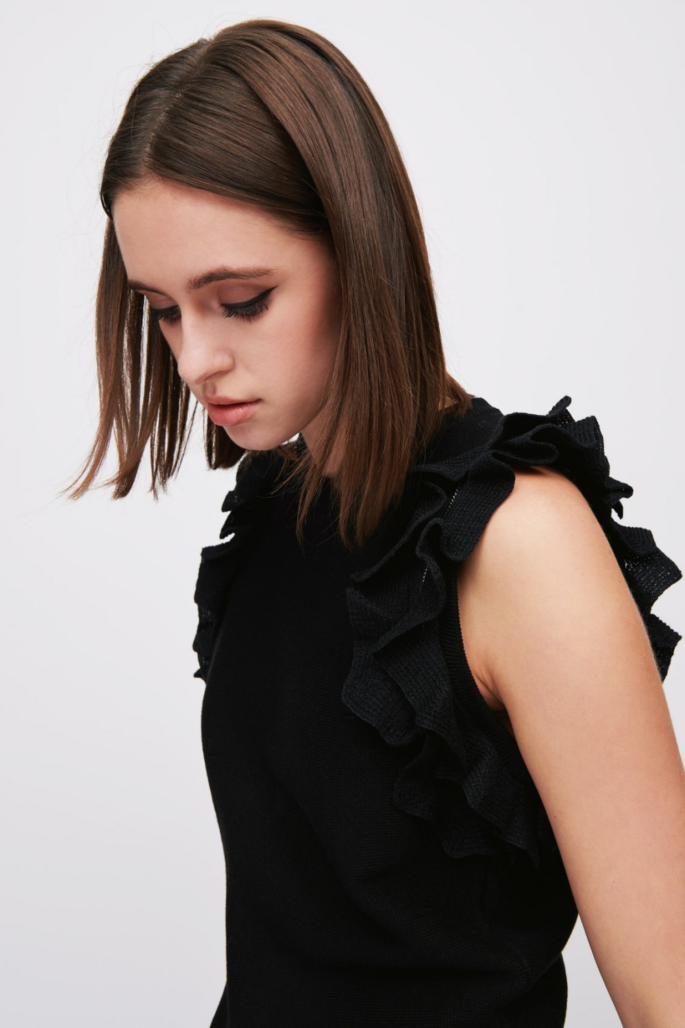 Black top with ruffles