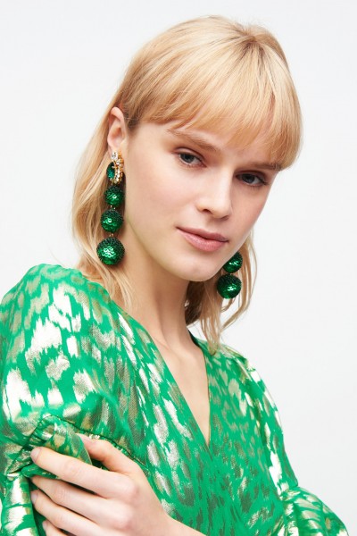 Earrings in green sequins