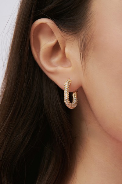 Golden oval earrings with zircons