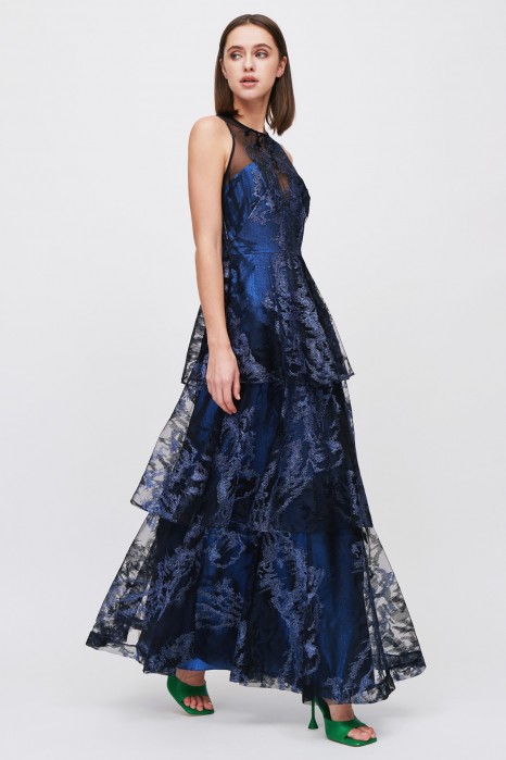 Noleggia online Robe longue en brocart lamine bleu et volants by Theia Drexcode