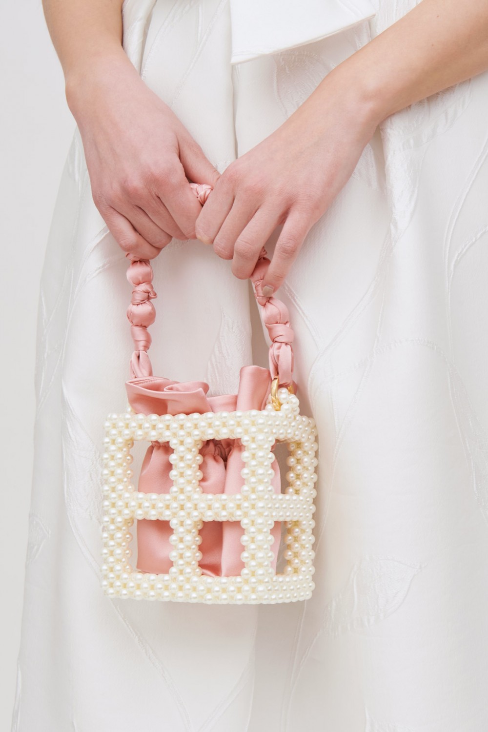 Borsa rosa con perle