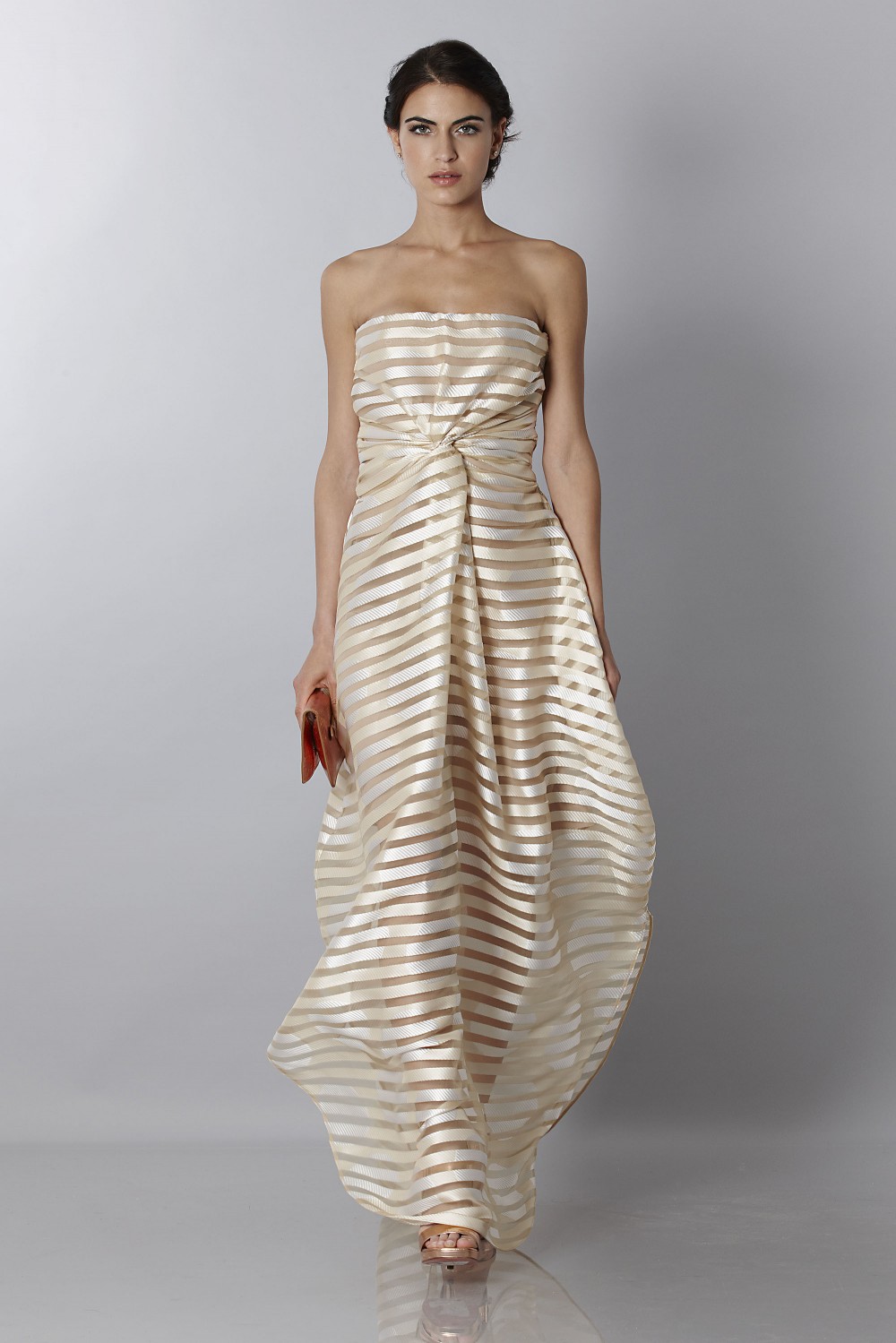 Abito bustier oro con trasparenze